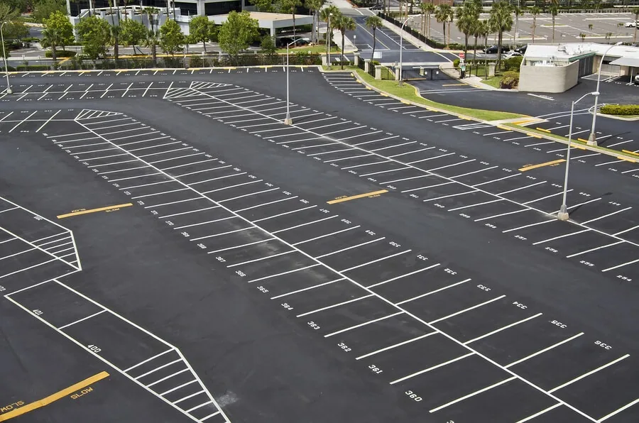 Empty Parking Lot With Numbered Spots