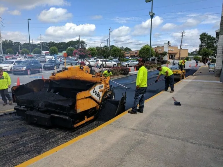 Blackjack Paving Contractors Laying Fresh Asphalt in Parking Lot