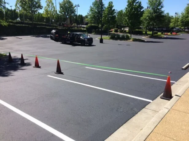 Parking lot lines being measured